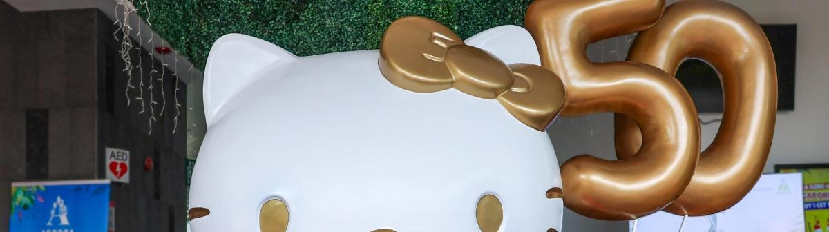 a couple of donuts sitting on top of a refrigerator