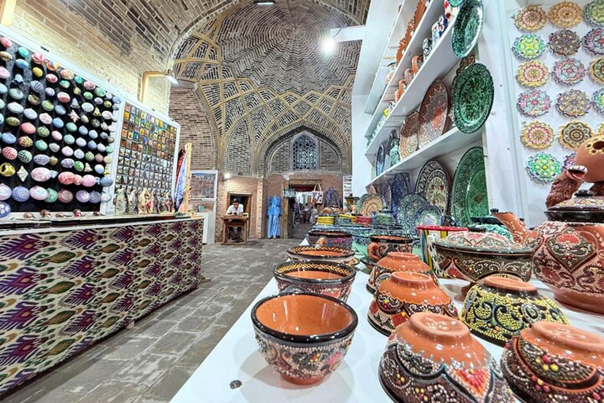 a store filled with lots of pottery on display