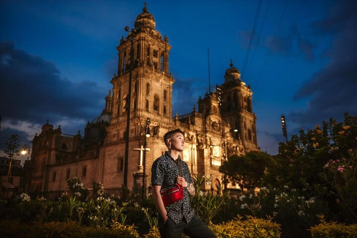 a man standing in front of a large building