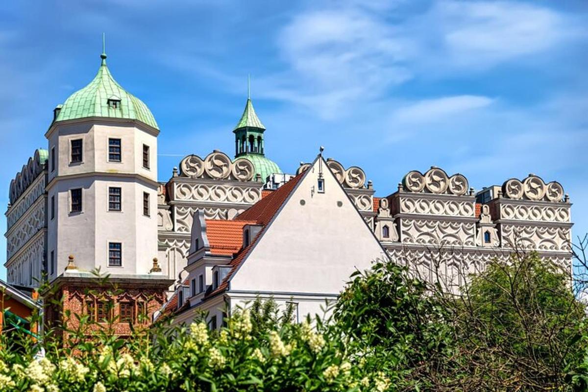 a large building with two towers on top of it