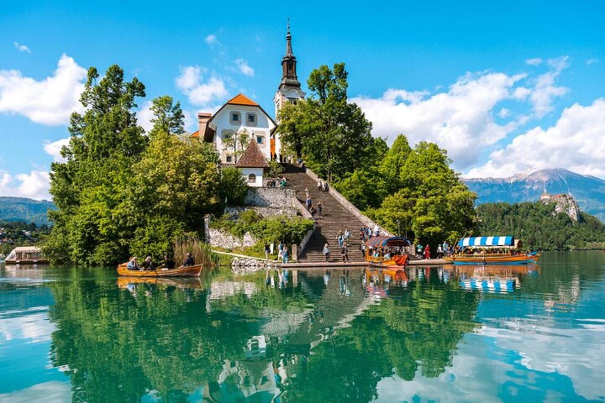 a church on an island in the middle of a lake