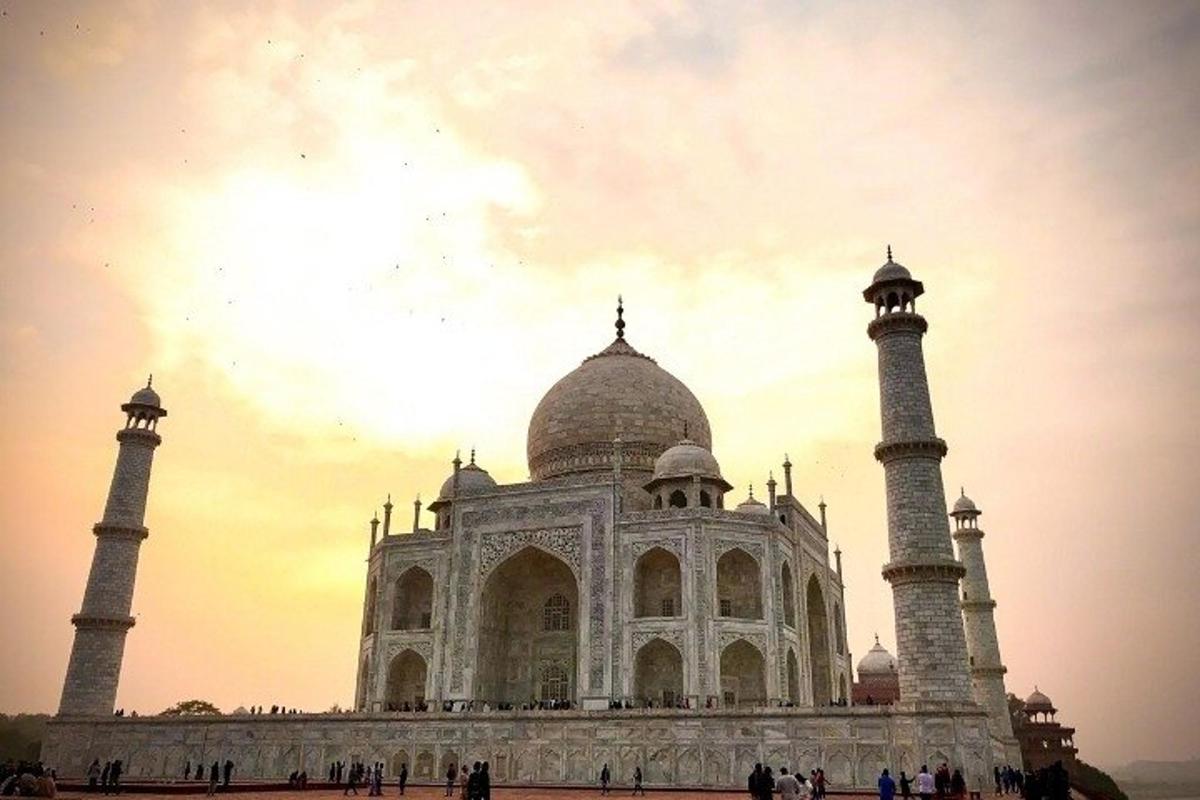 a building with two tall domes in front of it