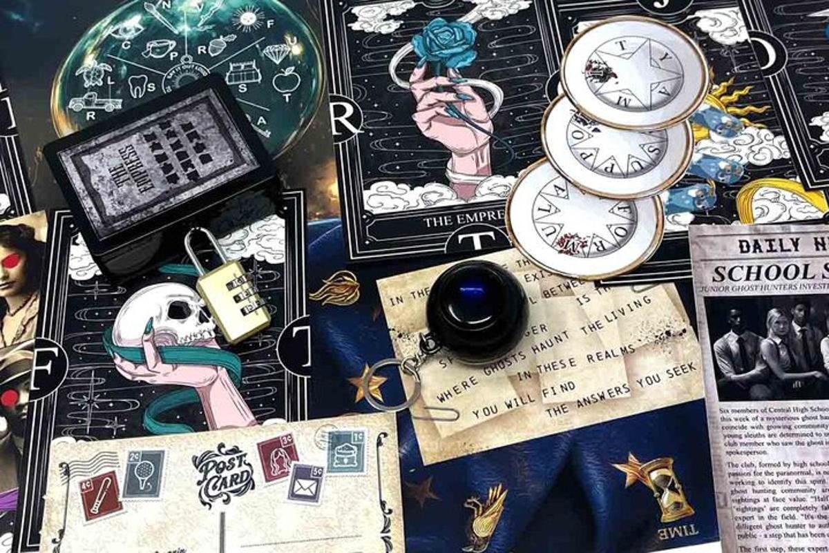 a table with clocks and other items on it