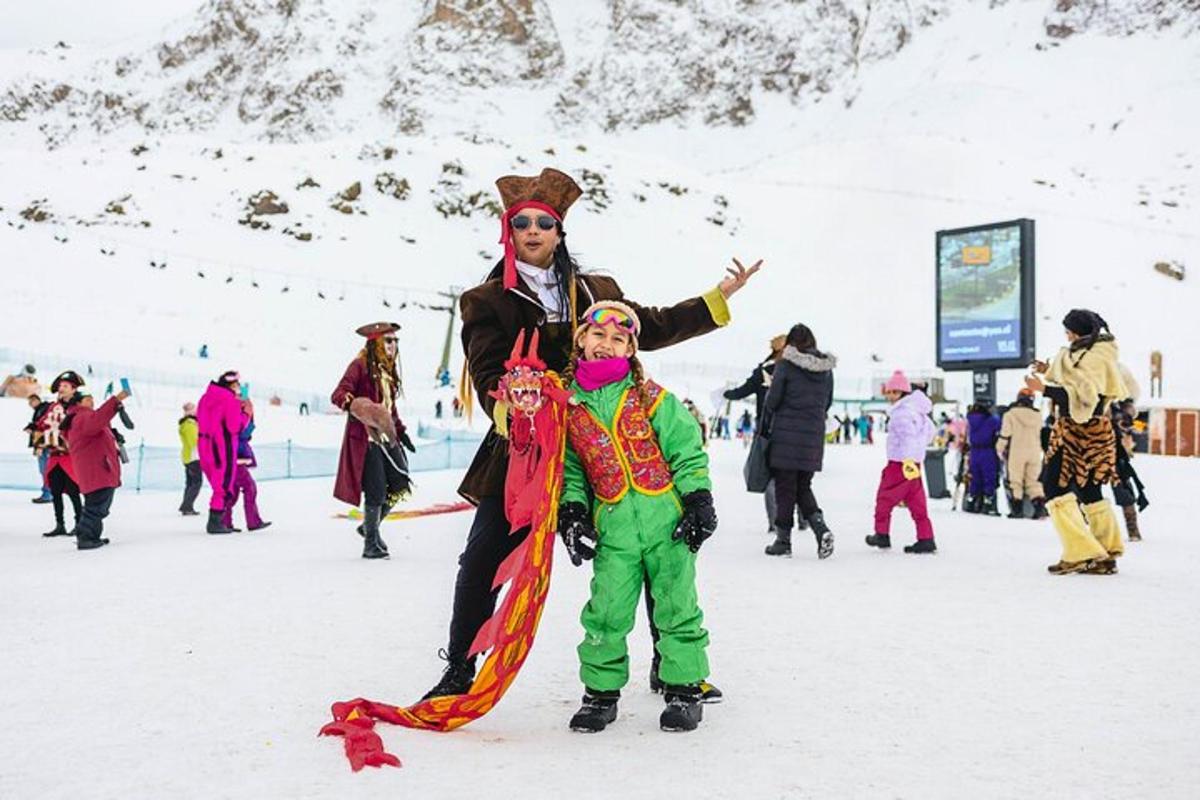 a man and a child standing in the snow