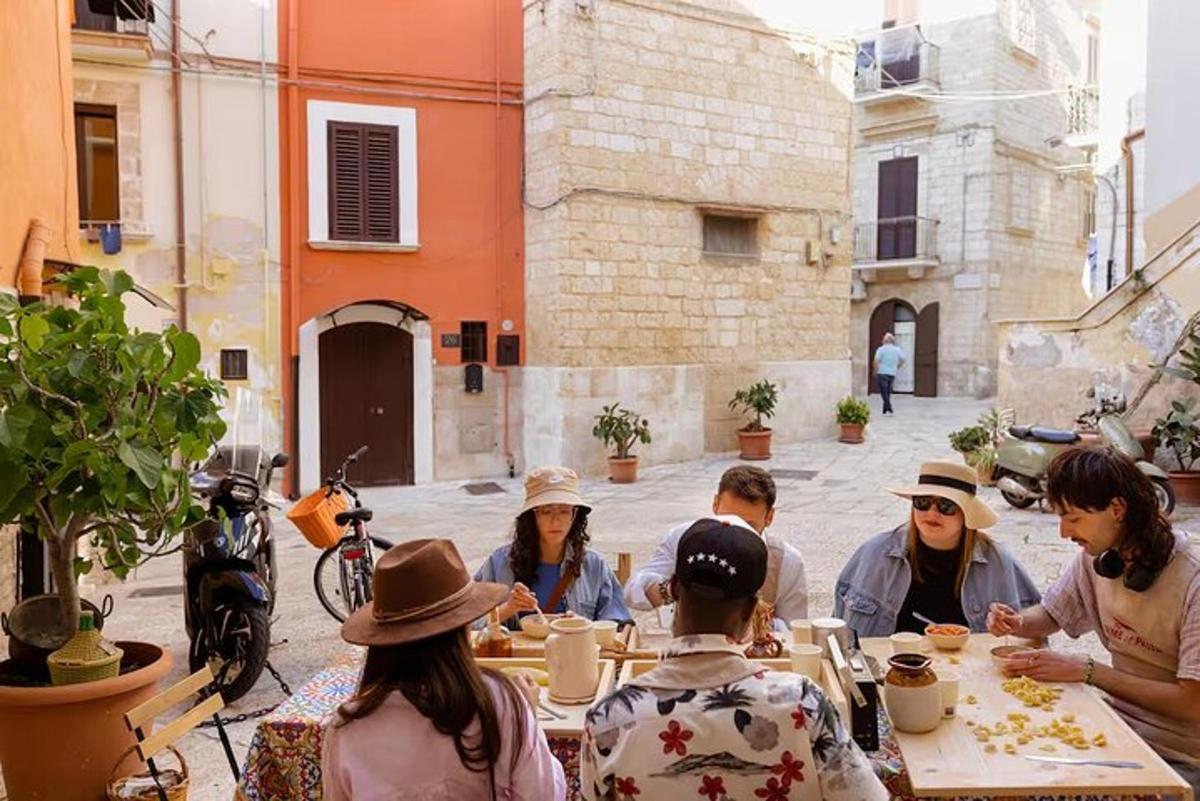 a group of people sitting at a table eating food