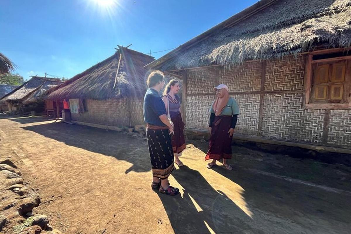 a group of people standing in front of a building