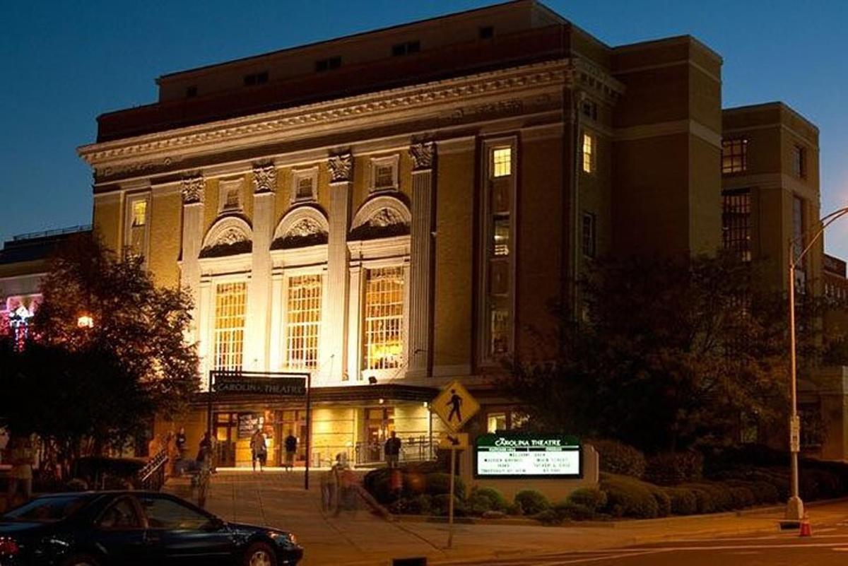 a large building with a car parked in front of it