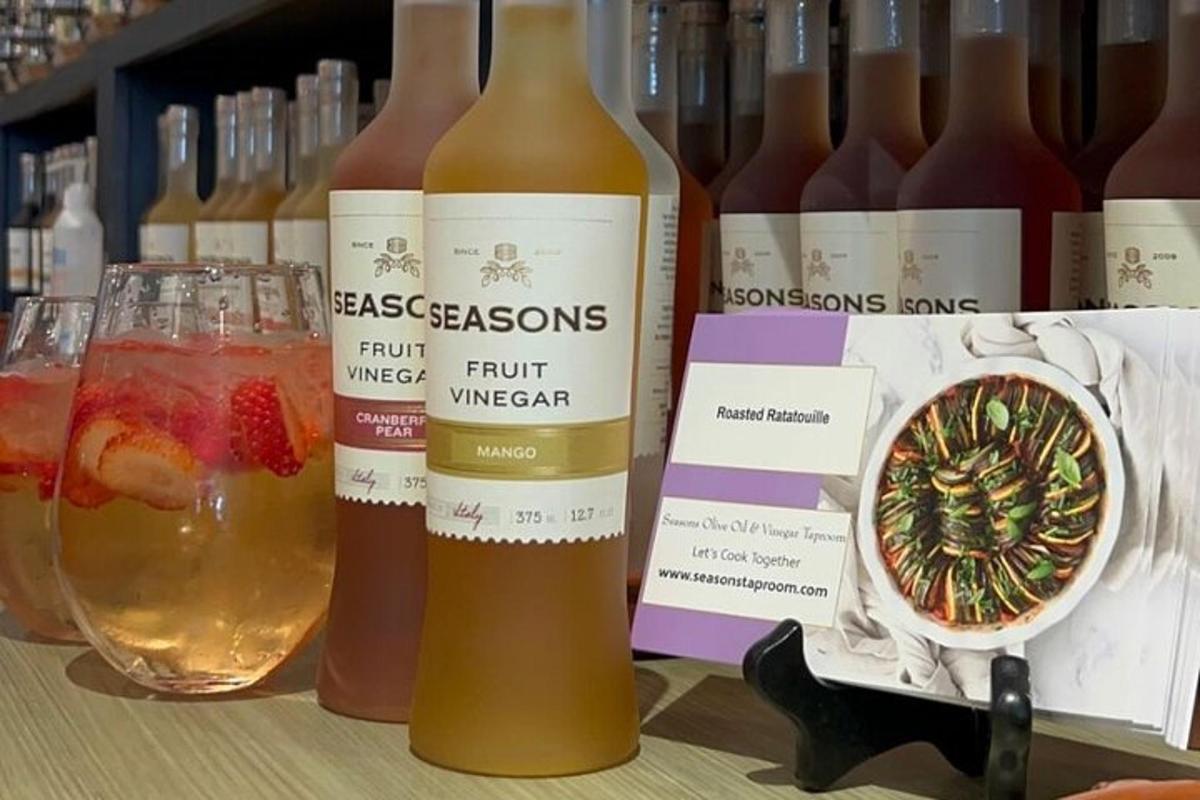 a bunch of bottles of wine on a table