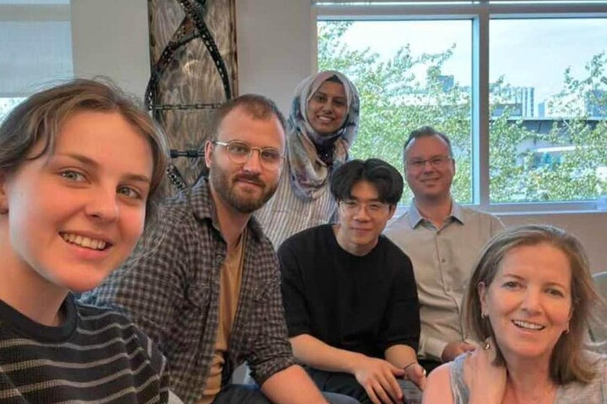 a group of people sitting on a couch