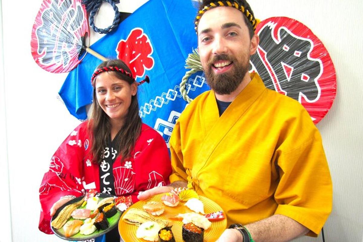 a man and a woman holding a plate of food