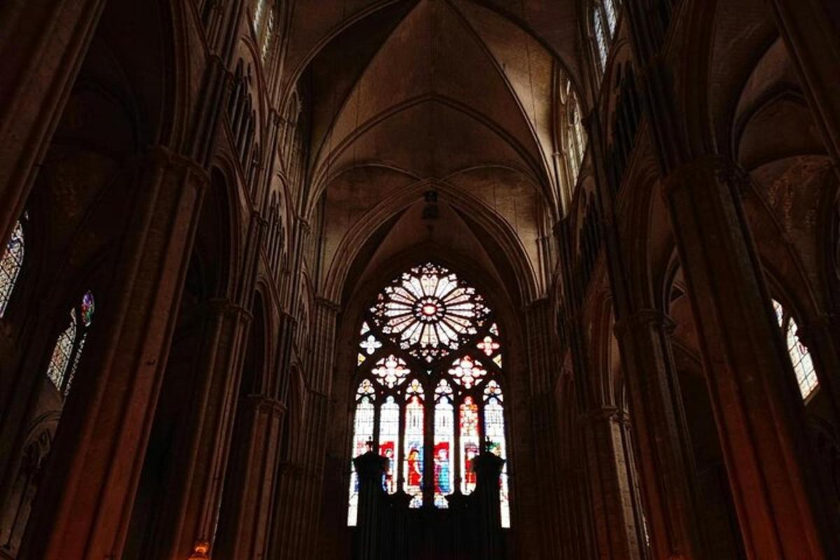 a large cathedral with a large window in it