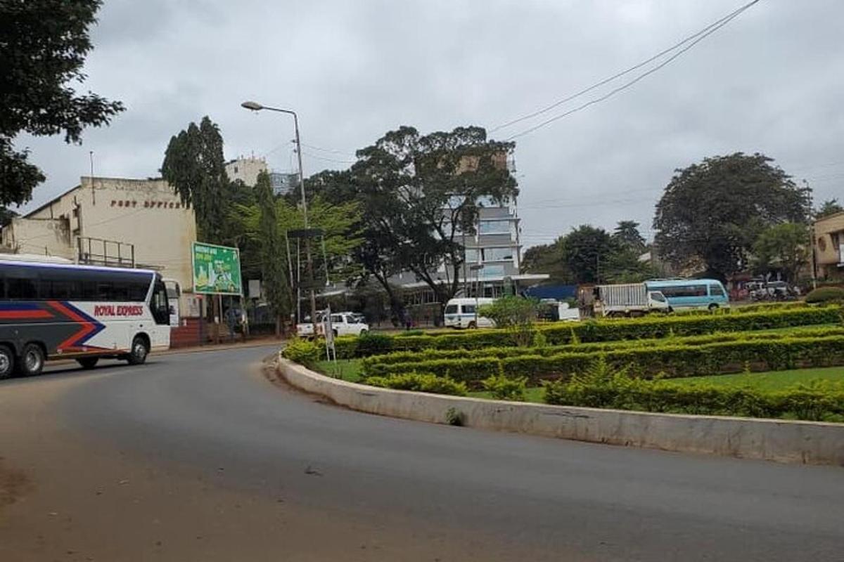 a bus is driving down a city street