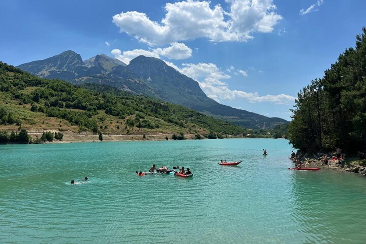 a group of people in boats on a river