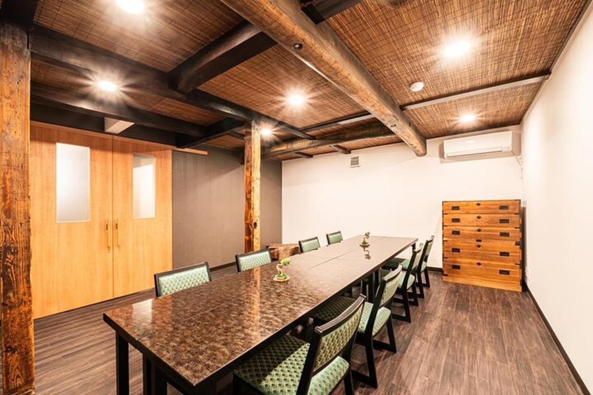 a conference room with a long table and chairs