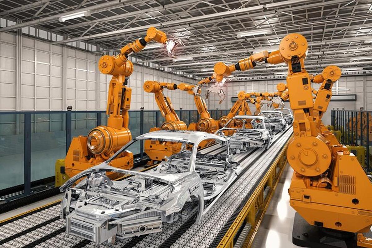 a row of yellow machines in a factory