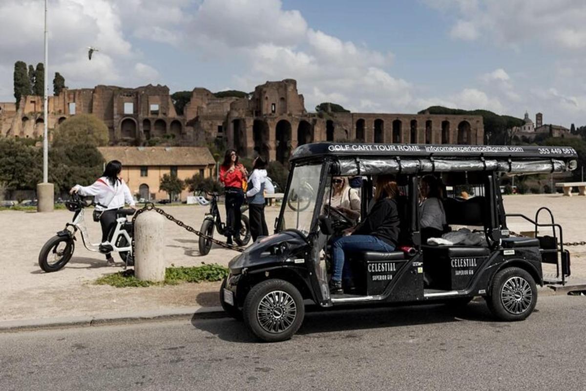 a group of people riding in a golf cart