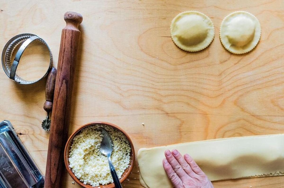 a table with a bowl of food and a spoon