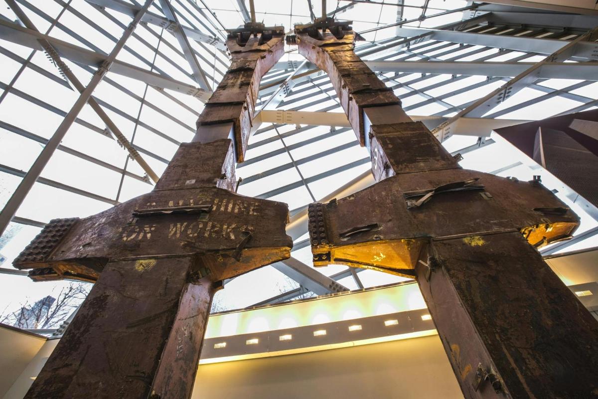 two crosses hanging from the ceiling of a building