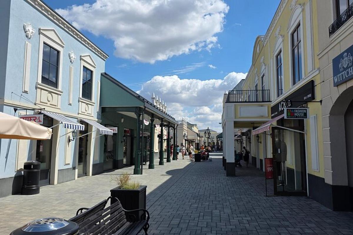 an empty street in a town with buildings