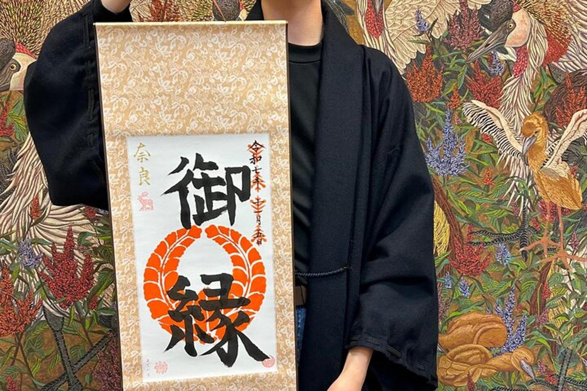 a person holding a sign with a picture of a snake