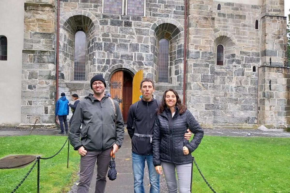 a group of people standing in front of a building