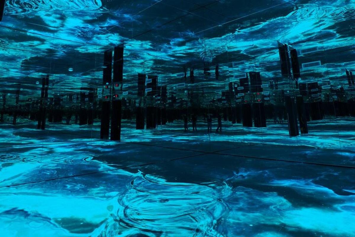 a blue painting of a city at night