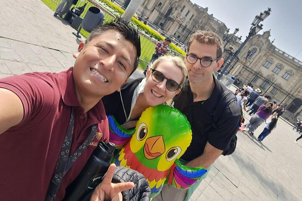 a group of three people posing for a picture