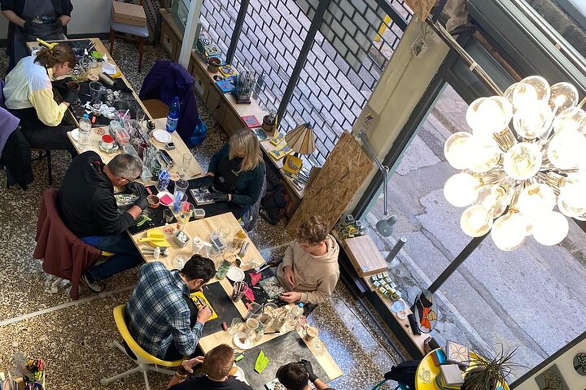 a group of people sitting at tables in a restaurant