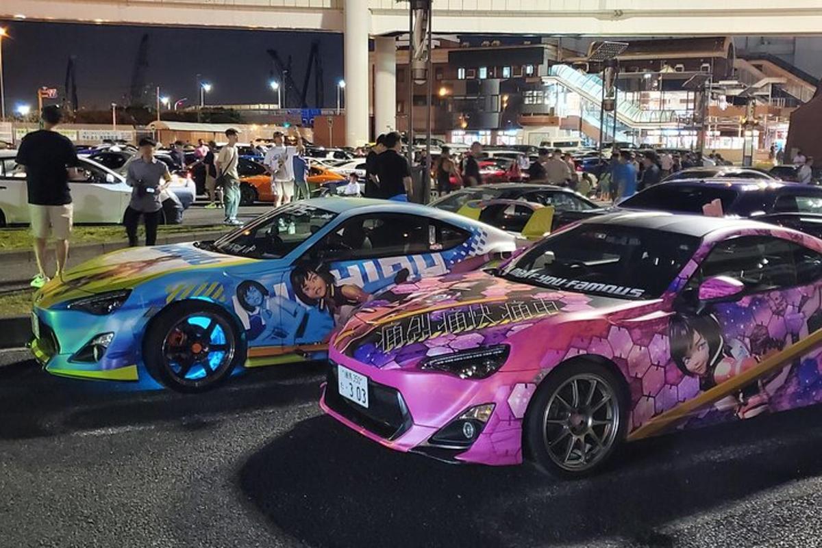 a group of cars parked in a parking lot