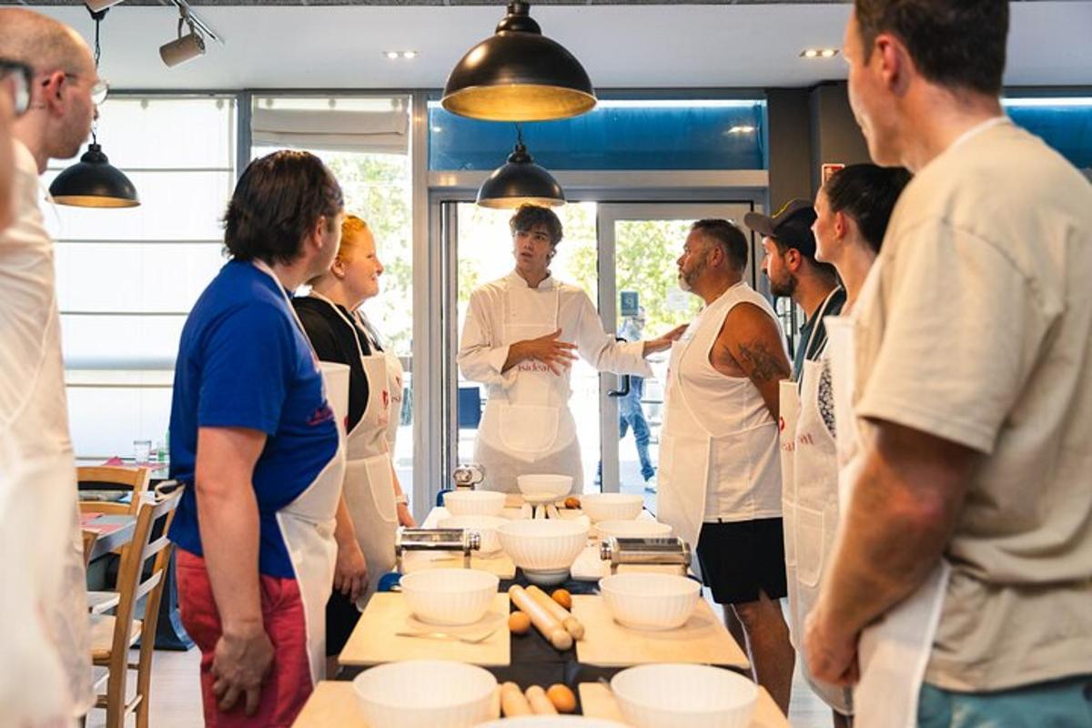 a group of people standing around a table with bowls