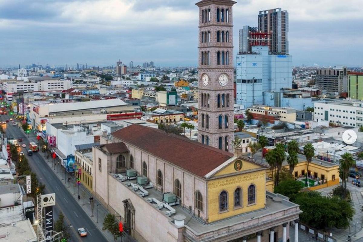 a building with a clock tower in a city