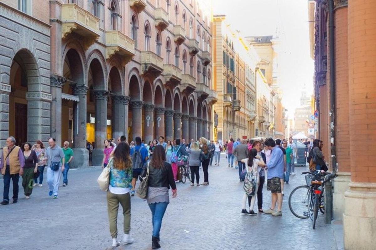 a group of people walking down a city street