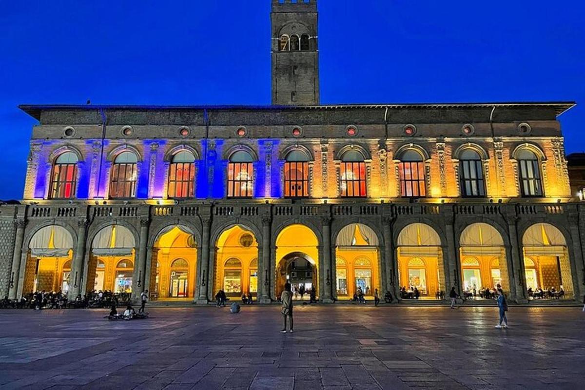 a large building with a lit up facade at night