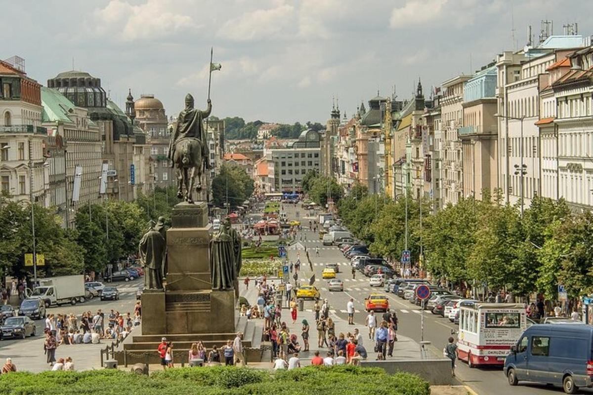 a statue of a man on a horse on a city street