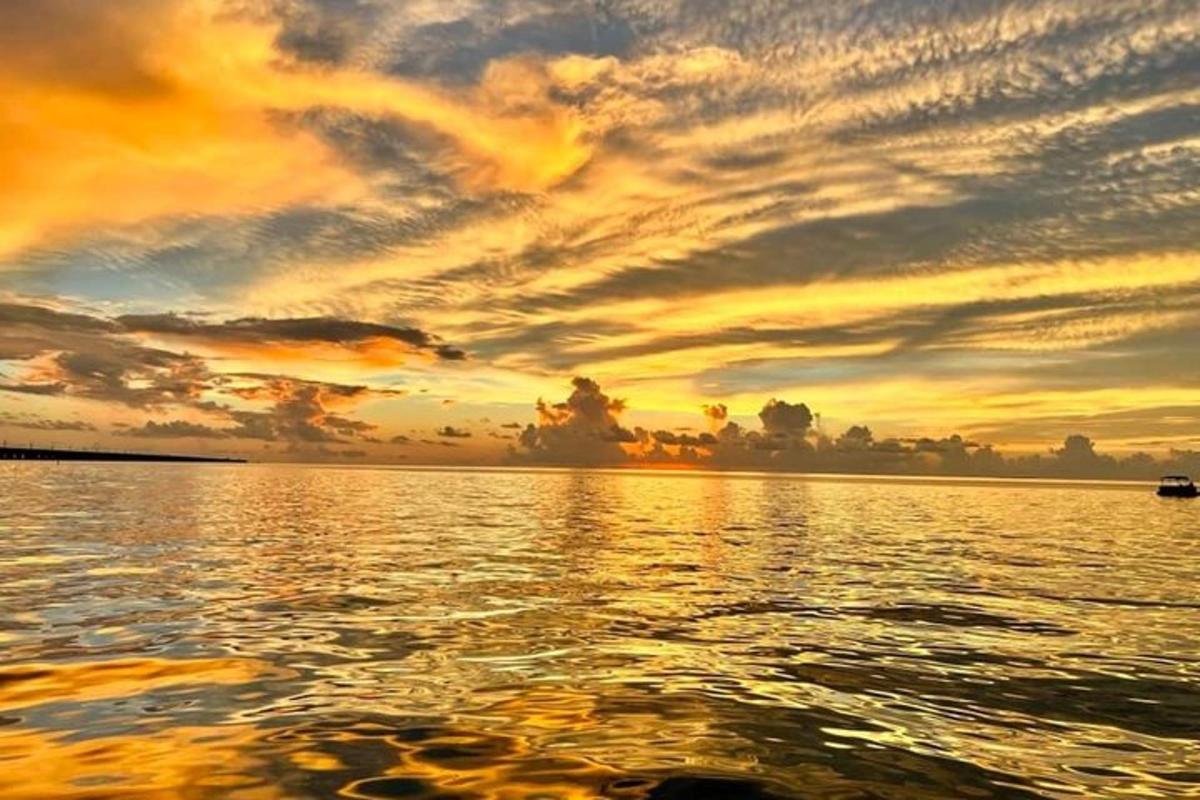 a sunset over a body of water