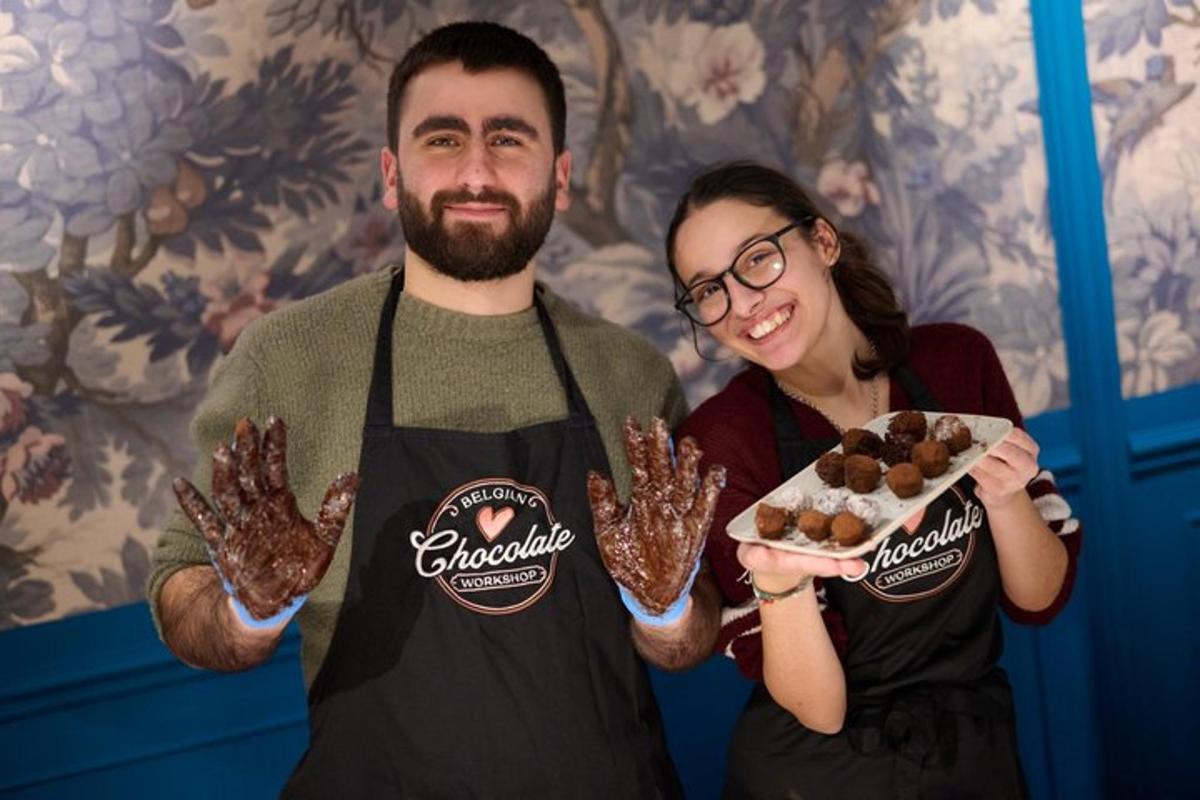 a man and a woman holding a plate of food