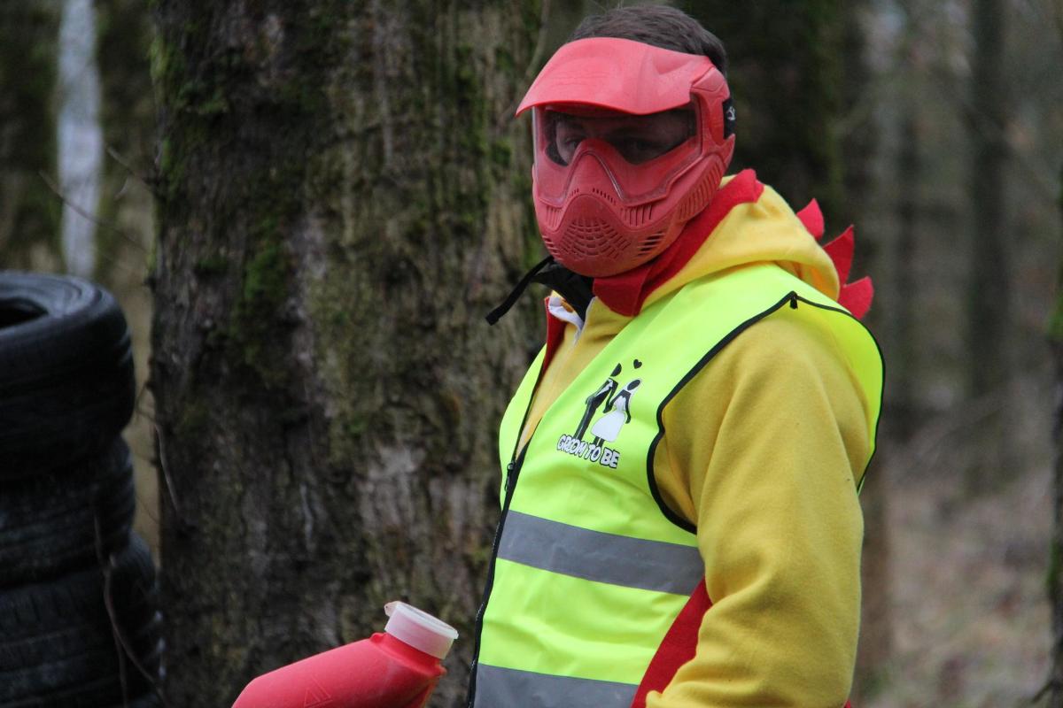 a person wearing a gas mask and a fire hydrant