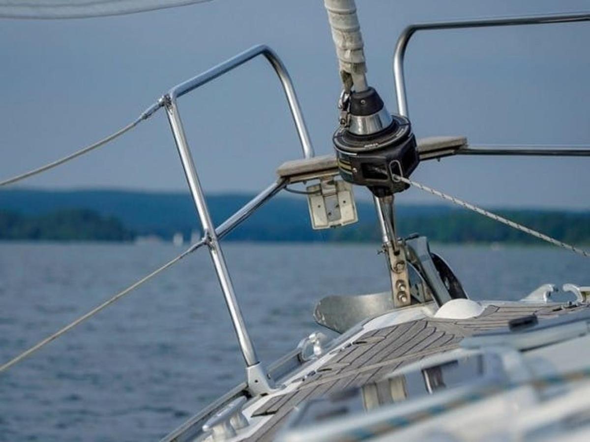 a view of the front of a boat on the water