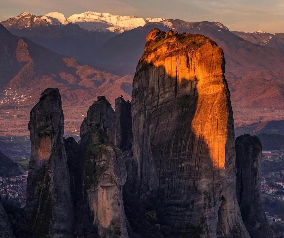a mountain with a view of a city