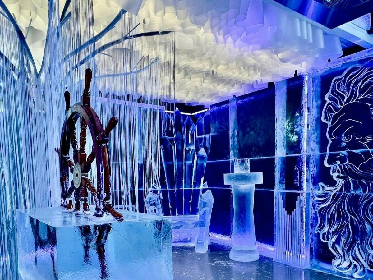 a room with ice and a clock on a table