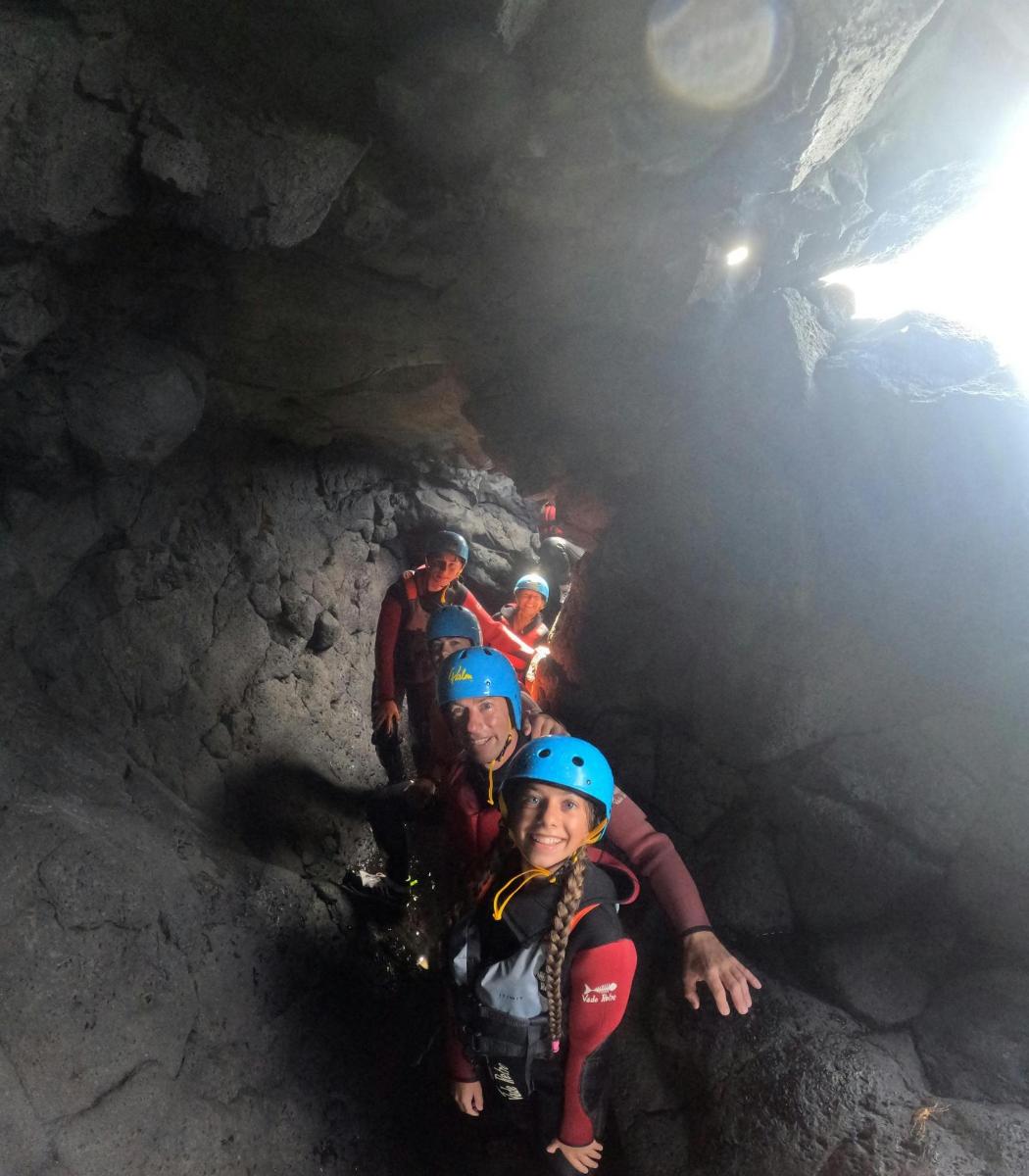 a group of people in a cave