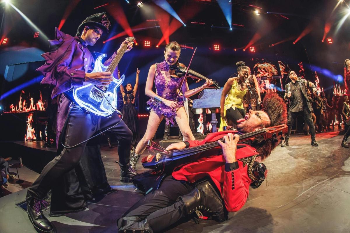 a group of people on a stage playing music