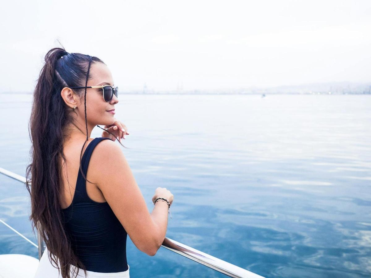 a woman on a boat in the water