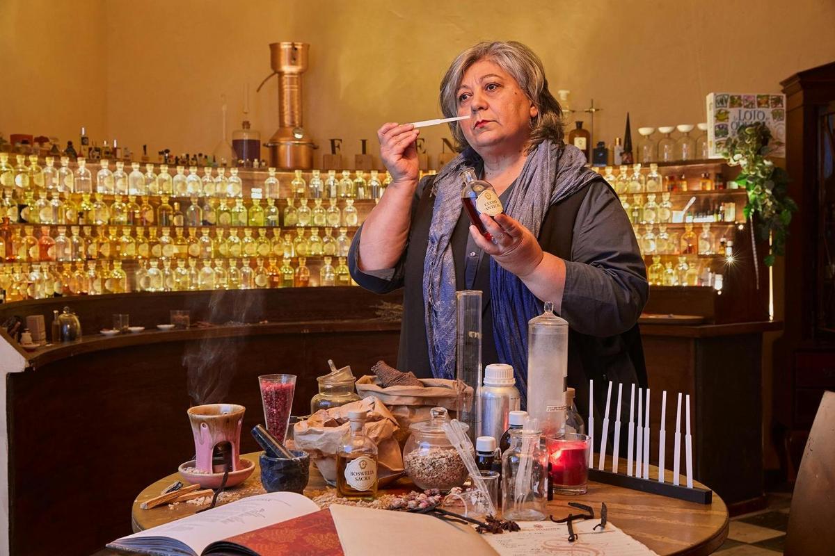 a woman brushing her teeth at a bar