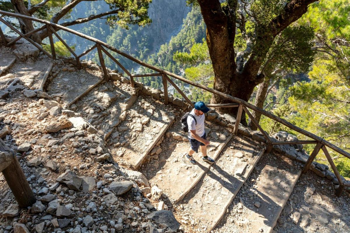 a man walking up a set of stairs