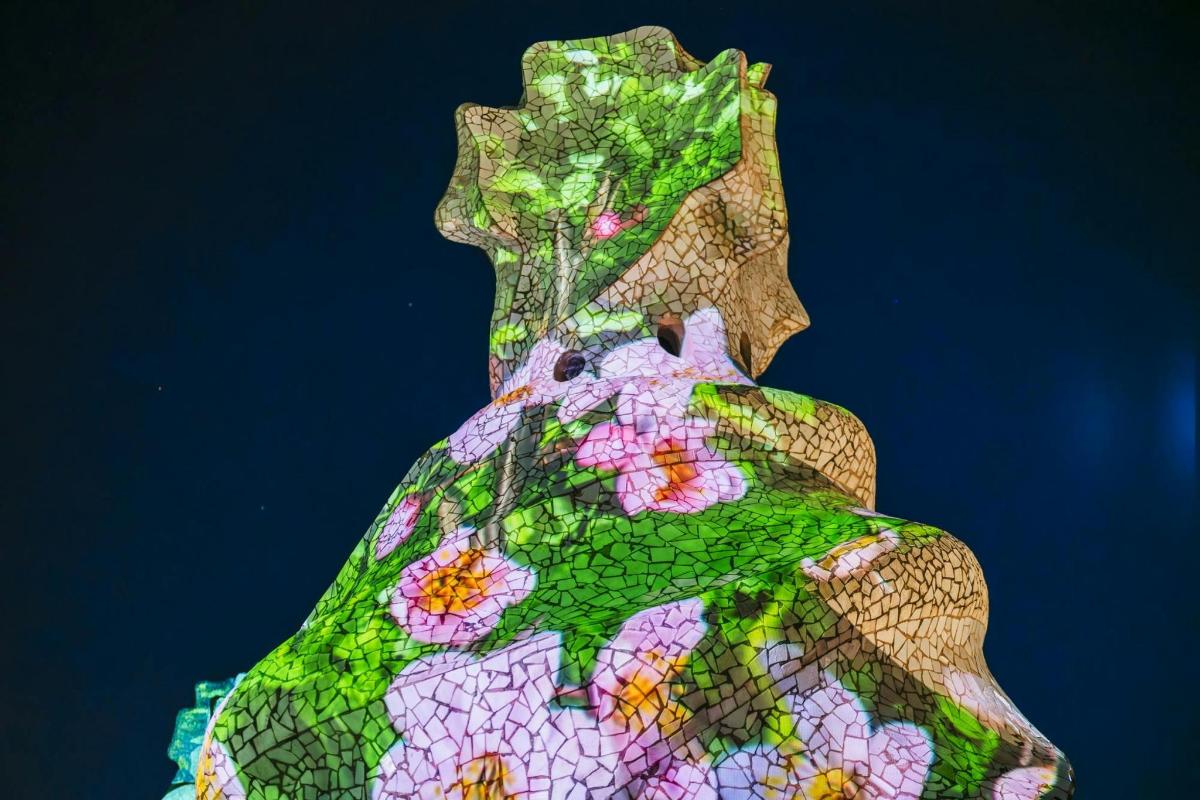 a vase with flowers painted on it