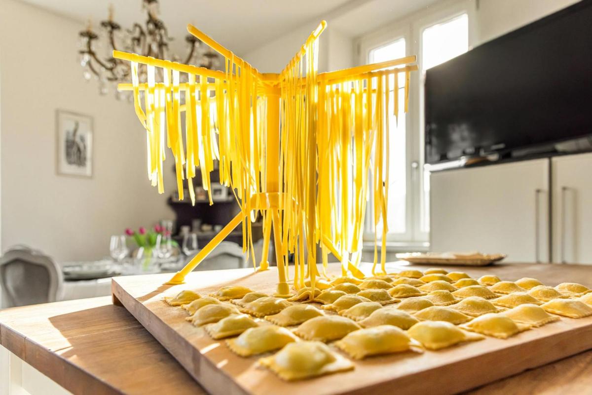 a bunch of pasta on a cutting board on a table