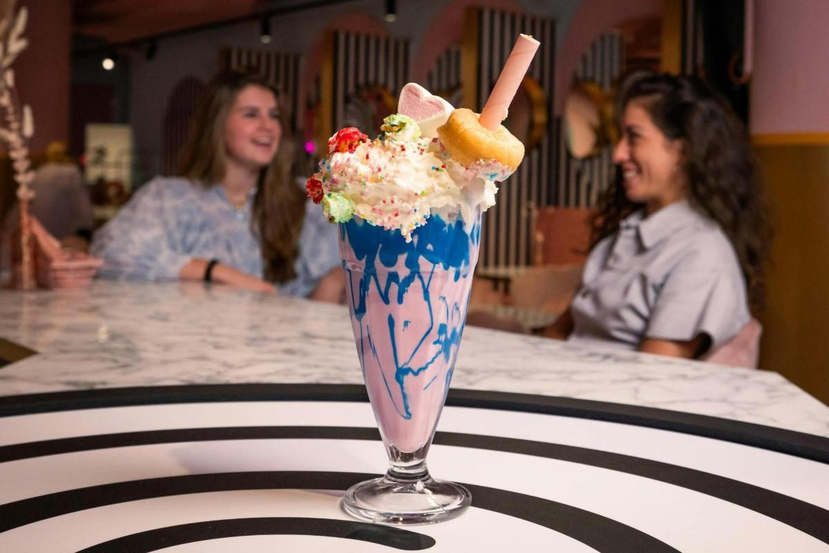 a milkshake in a glass on a table