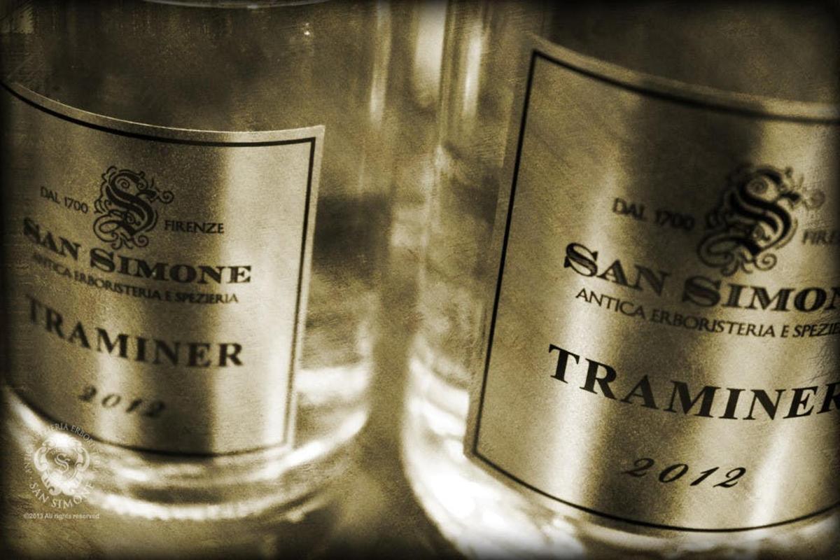 two empty wine glasses sitting next to each other