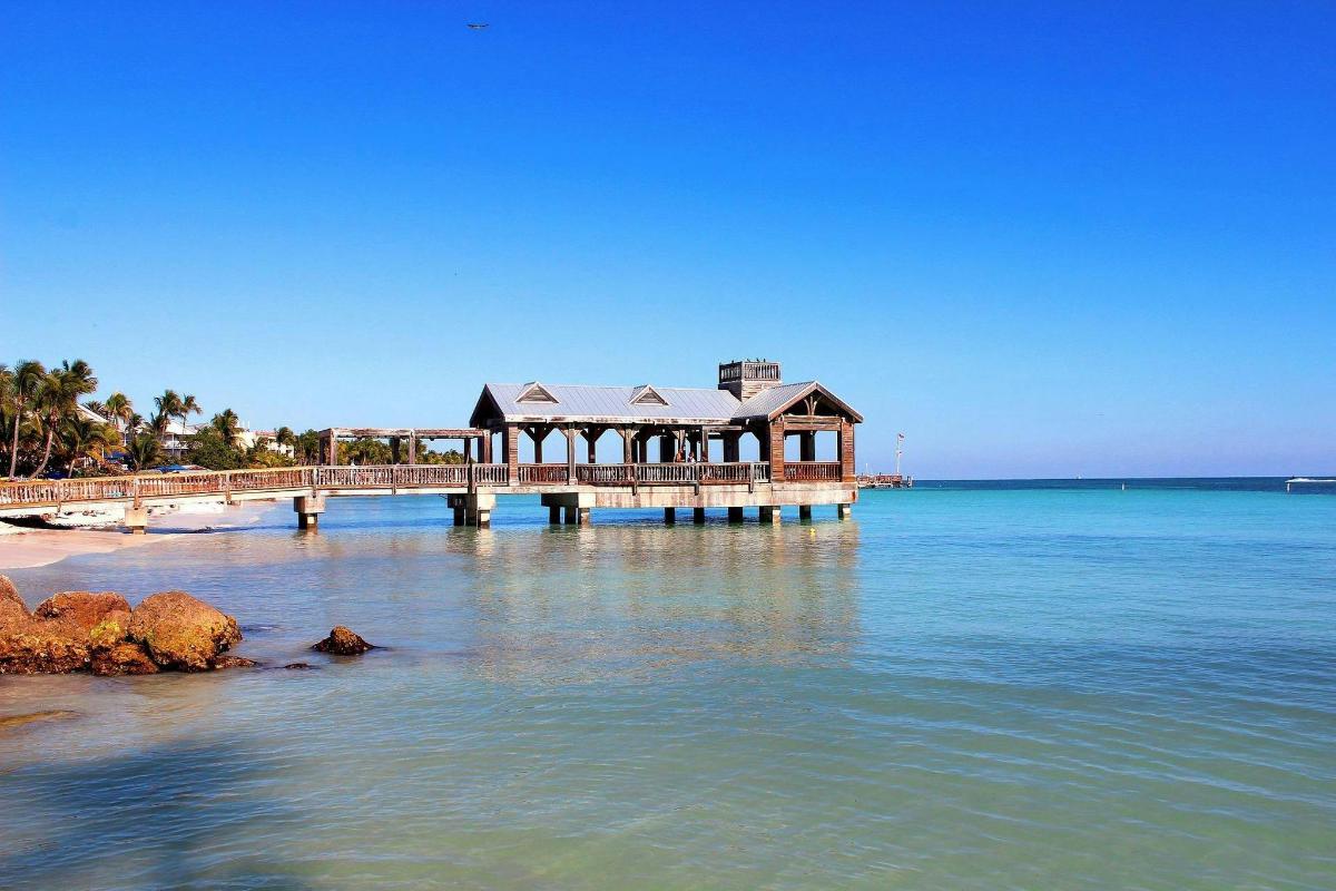 a house on a pier in the water